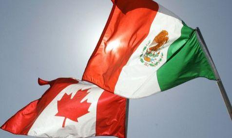 Las banderas de Canadá y México, el TLCAN un juego de dos para contrarrestar al tercero, Estados Unidos. (foto: Ansa)