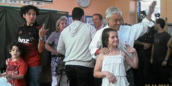 Reacción de votante ante sonriente Piñera
