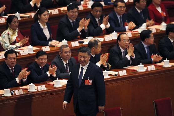 Delegados aplauden al presidente Xi Jinping