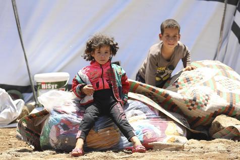 Niños sirios desplazados por el conflicto